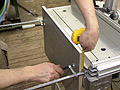 Настройка оборудования для фрезерования пазов в кромках гнутой филенки.